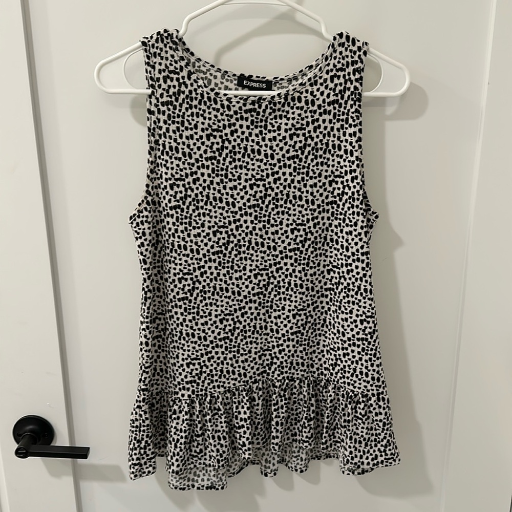 Black and white dotted tank.